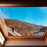 Au Pied De Vigne